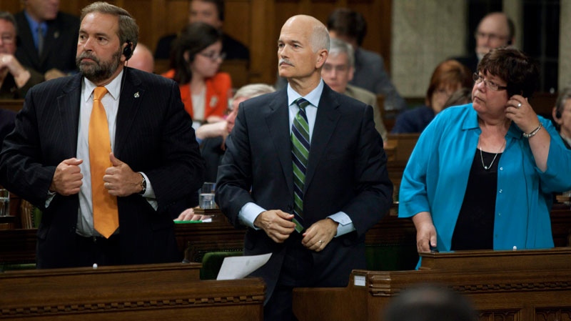 New Democratic Leader Jack Layton , middle, votes in the House of Commons on Parliament Hill in Ottawa on Wednesday Sept. 22, 2010. MPs have voted 153 to 151 to support a motion to kill Hoeppner's private member's bill that would have scrapped the registry. (Sean Kilpatrick / THE CANADIAN PRESS)