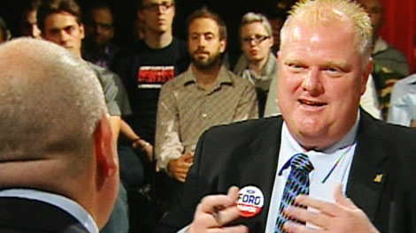 Rob Ford, right, and George Smitherman exchange jabs during a a CP24 debate on Tuesday, Sept. 21, 2010.