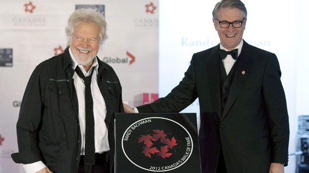 Musician Randy Bachman (left) stands with Bruce Rothney
