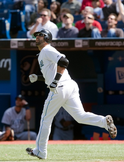 Toronto Blue Jays' Jose Bautista watches his 50th home run of the season during the first inning of a Major League baseball game against the Seattle Mariners in Toronto, Thursday Sept. 23, 2010. (Frank Gunn / THE CANADIAN PRESS)