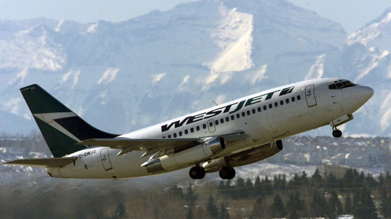 A WestJet plane takes off from the international airport in Calgary on February 13, 2003.