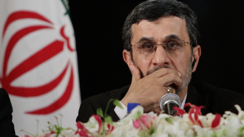 Iranian President Mahmoud Ahmadinejad listens during a news conference