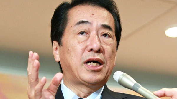 Japanese Prime Minister Naoto Kan answers reporters' questions about China's demand for apology and compensation, in Tokyo Sunday, Sept. 26, 2010.(AP Photo/Kyodo News)