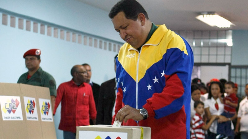Venezuela's President Hugo Chavez casts his ballot during legislative elections in Caracas, Venezuela, Sunday, Sept. 26, 2010. (AP / Leonardo Ramirez)