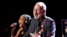 Legendary guitarist Pete Townshend, right, and Canadian Actress Niki James perform at the National Arts Centre in Ottawa for the Governor General's Performing Arts Awards gala Saturday, May 5, 2012.THE CANADIAN PRESS/Fred Chartrand.