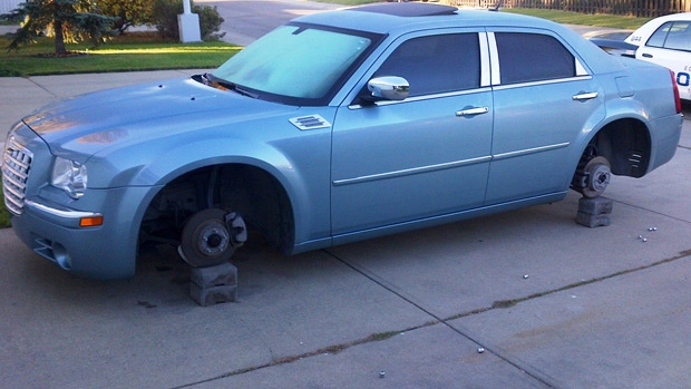 Police distributed this image of a vehicle that was targeted by tire and rim thieves. Supplied.