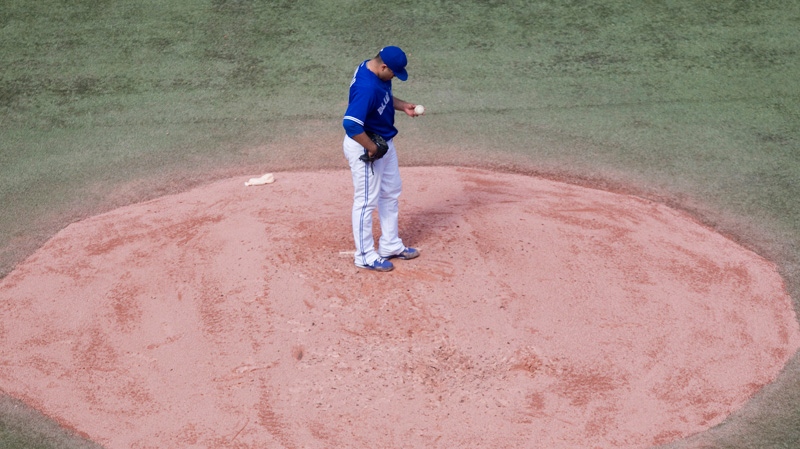 Toronto Blue Jays starting pitcher Ricky Romero stands on the mound on Sept. 29, 2012.