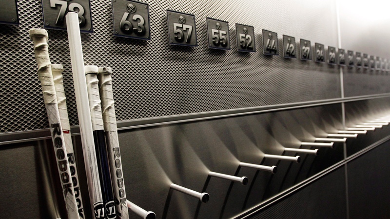 A nearly empty hockey stick rack in the Buffalo Sabres locker room on Sept. 25, 2012.