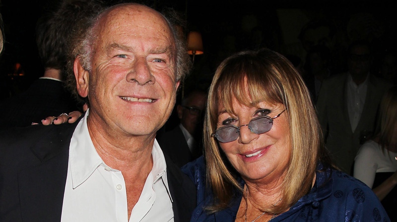 This image released by Starpix shows singer Art Garfunkel, left, and actress-director Penny Marshall at a book party for Marshall's memoir, "My Mother Was Nuts," Wednesday, Sept. 19, 2012, at Monkey Bar in New York. (AP Photo/Starpix, Dave Allocca)