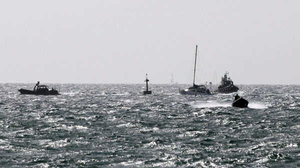 Israeli naval commando boats escort the Irene, center right, a boat carrying nine Jewish activists attempting to breach Israel's naval blockade of Gaza, to the port of Ashdod, in the Mediterranean sea, southern Israel, Tuesday, Sept. 28, 2010. (AP / Yehuda Lahyani)