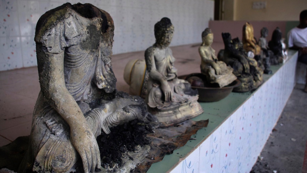 Damaged statues at a Buddhist temple that was torched in Ramu in the coastal district of Cox's Bazar