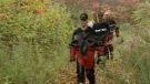 Police search a wooded area near a reservoir in Brockville for clues in the disappearance of an 80-year-old woman, Wednesday, Sept. 29, 2010.