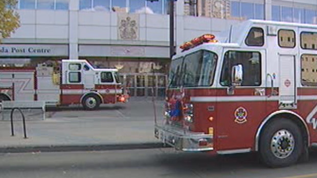 Crews battle fire in basement of old Canada Post building in Winnipeg
