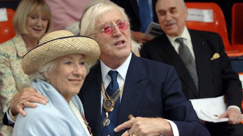 Jimmy Savile, right, and Vera Lynn in London, England on Sept. 18, 2005.