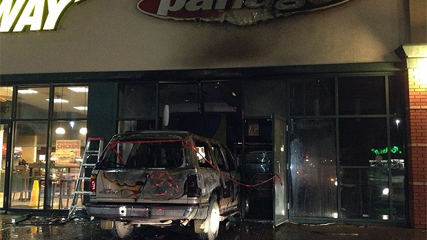 Panago car in window fire