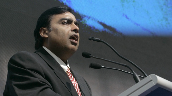 Reliance Industries Chairman Mukesh Ambani addresses a press conference in Thane, India, Sunday, Sept. 21, 2008. Ambani retained his No. 1 rank in FOrbes' 100 riches Indian tycoons for the third straight year. (AP Photo/Rajanish Kakade)