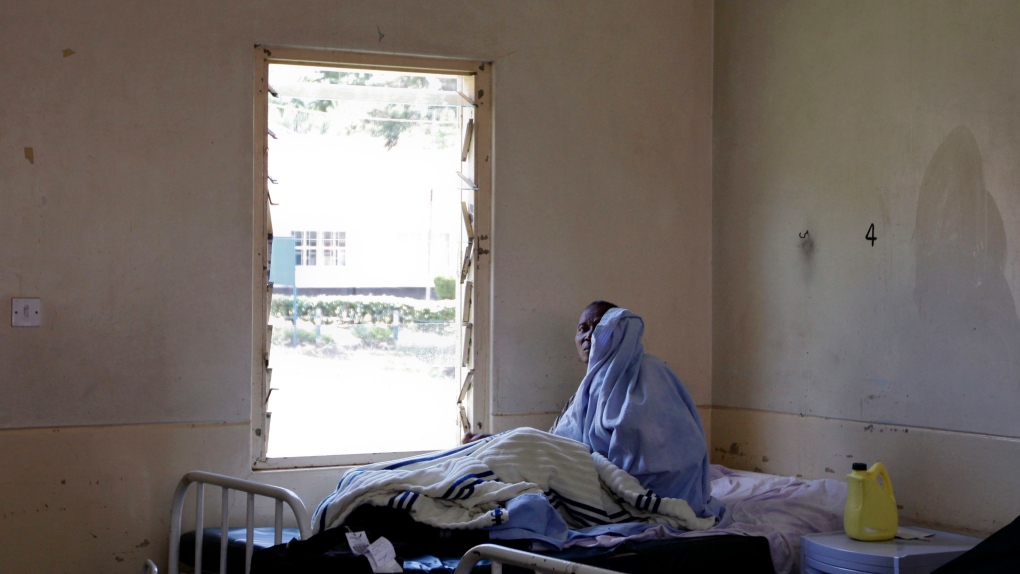 A patient is seen in the hospital bed at Mbagathi District Hospital in Nairobi, Kenya
