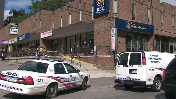Toronto police at the scene of a bank robbery at 901 Jane St. on Friday, Oct. 1, 2010.