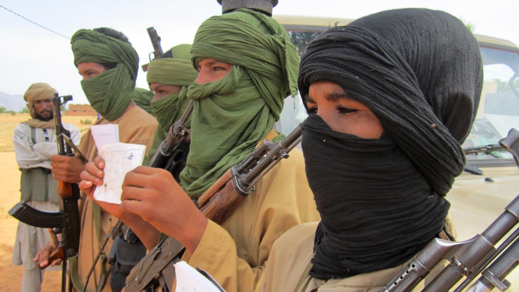 Young fighters, including 13-year-old Abdullahi, right, and 14-year-old Hamadi, second right, displa