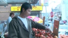 David Chen, who faces charges for detaining a shoplifter, outside of his Chinatown grocery store on Sunday, Oct. 3, 2010.