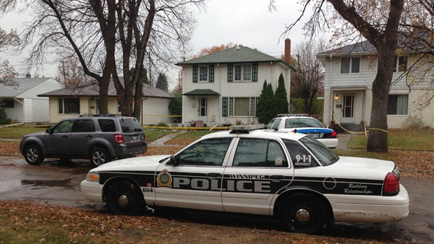 Officers investigate on Oct. 8 following the stabbing on Lindsay Street in River Heights. 