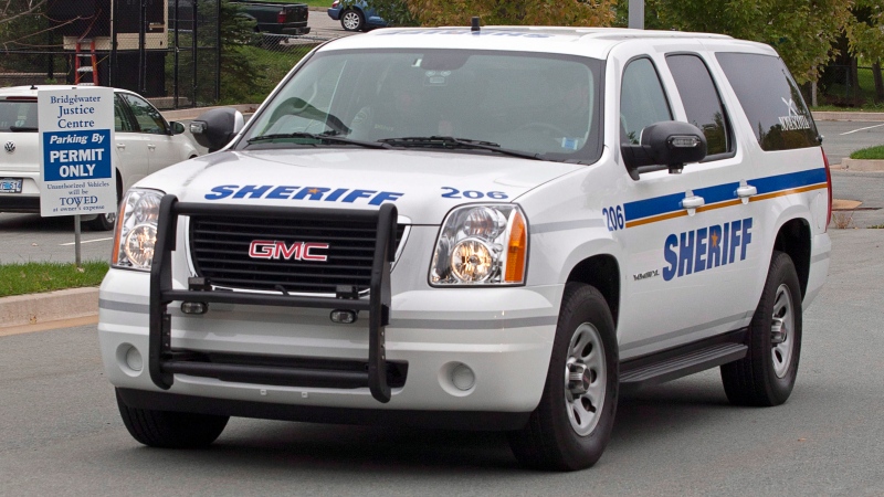 A sheriff's vehicle transports David James Leblanc, facing charges of sexually assaulting and confining a teenage boy, from provincial court in Bridgewater, N.S. on Tuesday, Oct. 9, 2012. (Andrew Vaughan / THE CANADIAN PRESS)