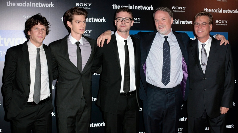 esse Eisenberg, left, Andrew Garfield, second from left, Justin Timberlake, center, U.S director David Fincher, second from right and U.S scriptwriter Aaron Sorkin, right, pose for photographers as they arrive to 'The Social Network' premiere, in Paris, Sunday Oct. 3, 2010. (AP / Thibault Camus)