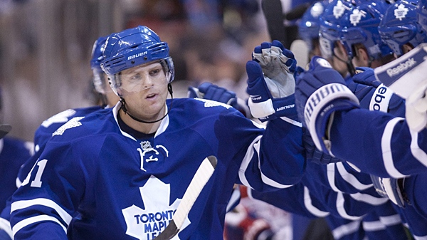 Toronto Maple Leafs' Phil Kessel is congratulated after his goal during first-period NHL hockey action against the Montreal Canadiens in Toronto on Thursday, Oct. 7, 2010. (AP Photo/The Canadian Press, Frank Gunn)