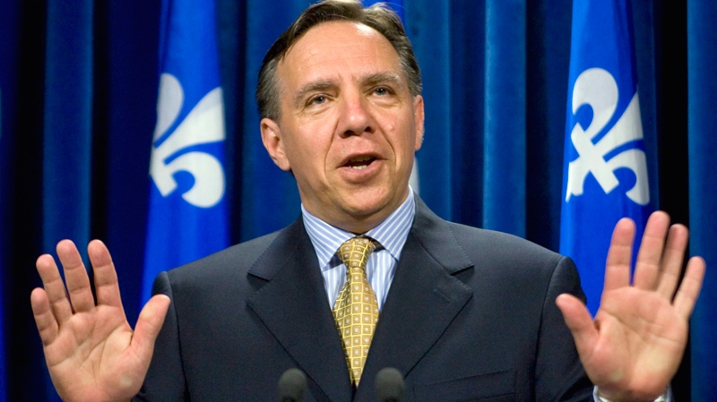 Then-Parti Quebecois legislature finance critic Francois Legault announces his resignation Thursday, June 25, 2009 at the Quebec legislature. (Jacques Boissinot / THE CANADIAN PRESS)  
