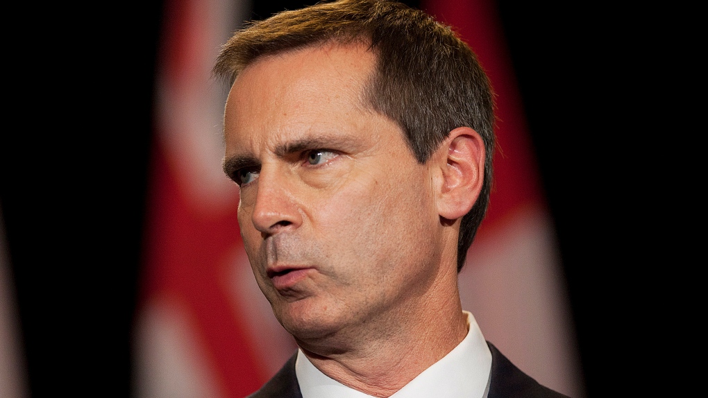 McGuinty announcing his resignation 