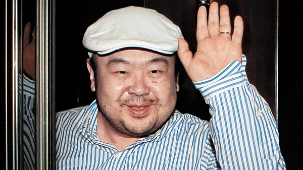  In this June 4, 2010 file photo, Kim Jong Nam, the eldest son of North Korean leader Kim Jong Il, waves after his first-ever interview with South Korean media in Macau, China. (AP / JoongAng Sunday via JoongAng Ilbo, Shin In-seop) 