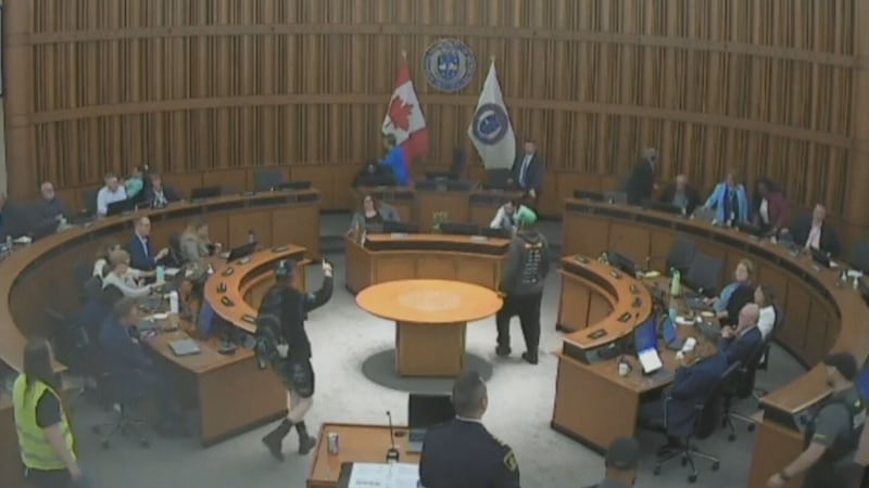 ‘Council should be disbanded’: Protesters storm regional council chambers during meeting