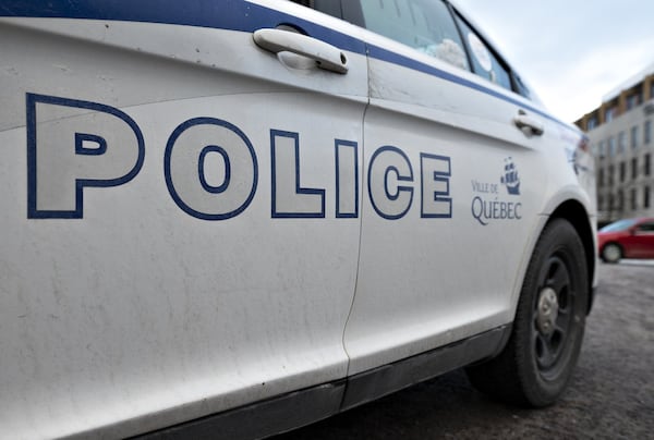 Man, 71, facing charges after Quebec City police officer struck on road while directing traffic