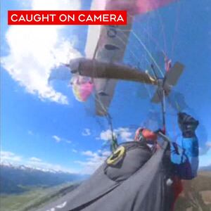 Terrifying moment a plane rams into paraglider’s canopy, sending her plunging to Earth