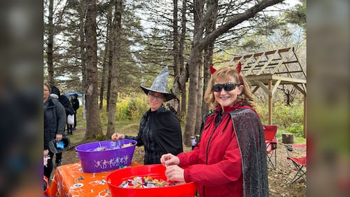 Two women, dressed as a witch and a devil, are pictured at the Gaetz Brook Greenway during the Halloween Trick-or-Treat Trail Walk in East Chezzetcook, N.S., on October 25, 2025. (Emma Convey / CTV Atlantic)