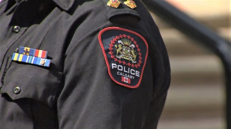 Calgary police officer cleared of wrongdoing in suspect chase that resulted in dog bite
