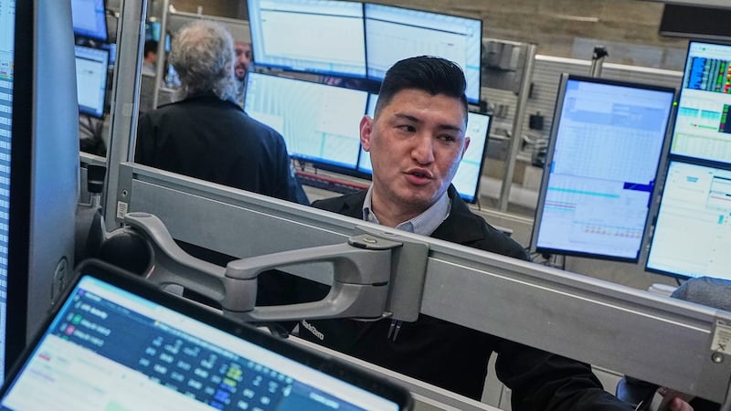 Tech carries Wall Street to records, even as most stocks fall after discouraging inflation data