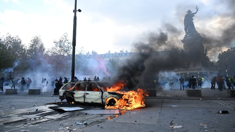 Clashes and fires break out as protesters rally across France, joining students