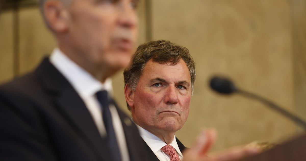 Canada-U.S. Trade Minister Dominic LeBlanc listens as Prime Minister Mark Carney speaks about Canada's response to new U.S. tariffs during a news conference on Parliament Hill in Ottawa on Saturday, Aug. 22, 2026.