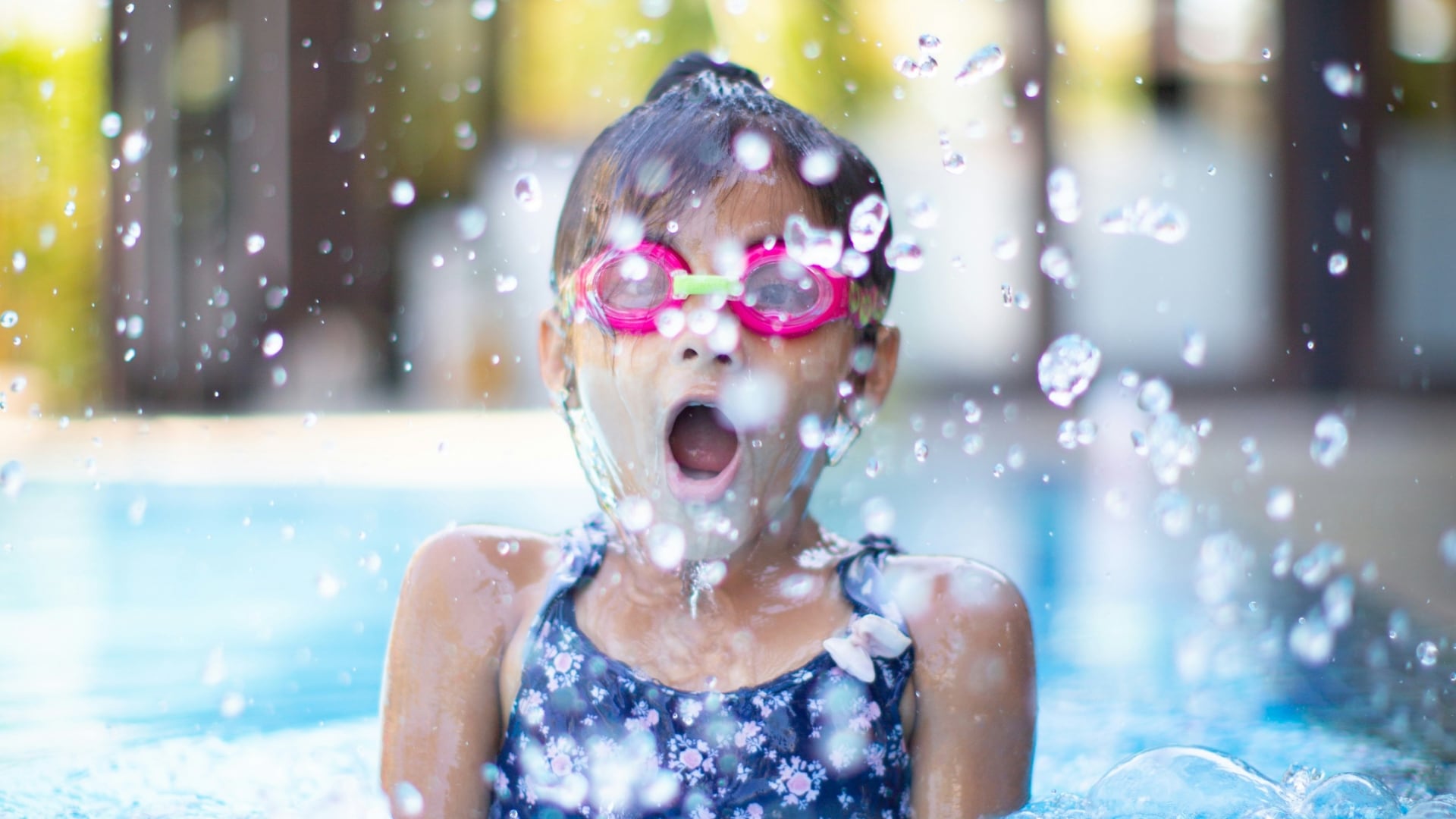 A stock photo of a young girl in a swimming pool. (Unsplash/Raj Rana)