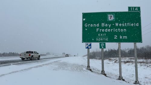 A light dusting of snow is pictured on Route 1 near Fredericton, N.B., on Jan. 26, 2026. (CTV Atlantic / Avery MacRae)
