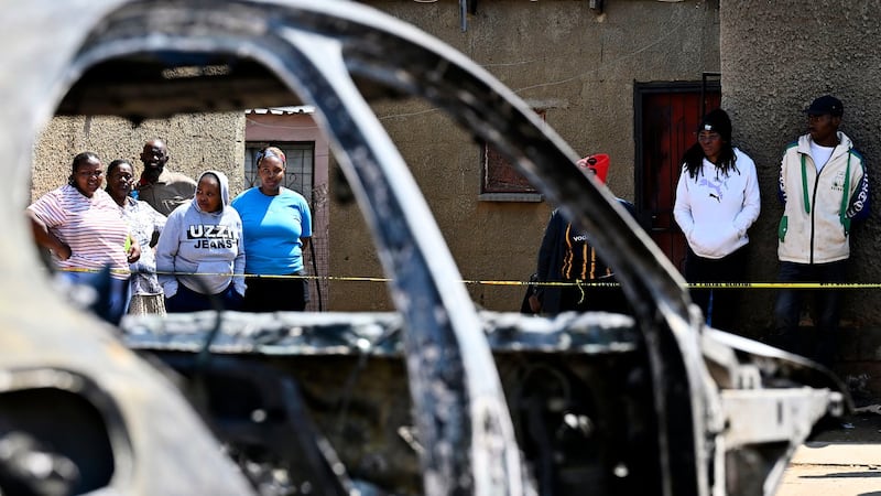 Police hunt gunmen after 2 mass shootings in South Africa leave at least 27 dead