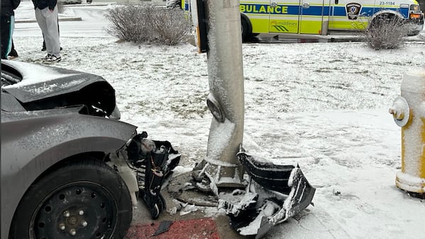 Car slams into traffic pole at busy east-end intersection