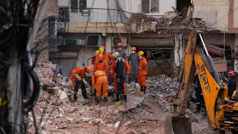 Rescuers look for survivors after New Delhi hostel collapse kills 7