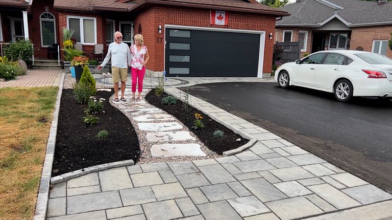Kanata couple told to rip out $40K landscaping over bylaw violation