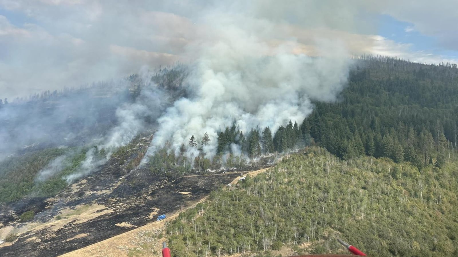 The Bradley Creek wildfire burns west of Vernon, B.C., in this Saturday, Aug. 1, 2026 handout photo. THE CANADIAN PRESS/Handout - B.C. Wildfire Service (Mandatory Credit)