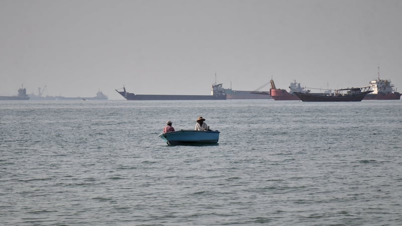 Tensions flare near Strait of Hormuz as a ship is seized and another is sunk