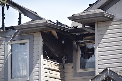 A duplex at 29 Avenue and 15 Street was damaged by fire on May 12, 2026. (Dave Mitchell/CTV News Edmonton)