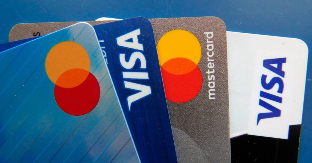 High Card Inflation Credit card debt at record high amid stubbornly hot inflation, survey says