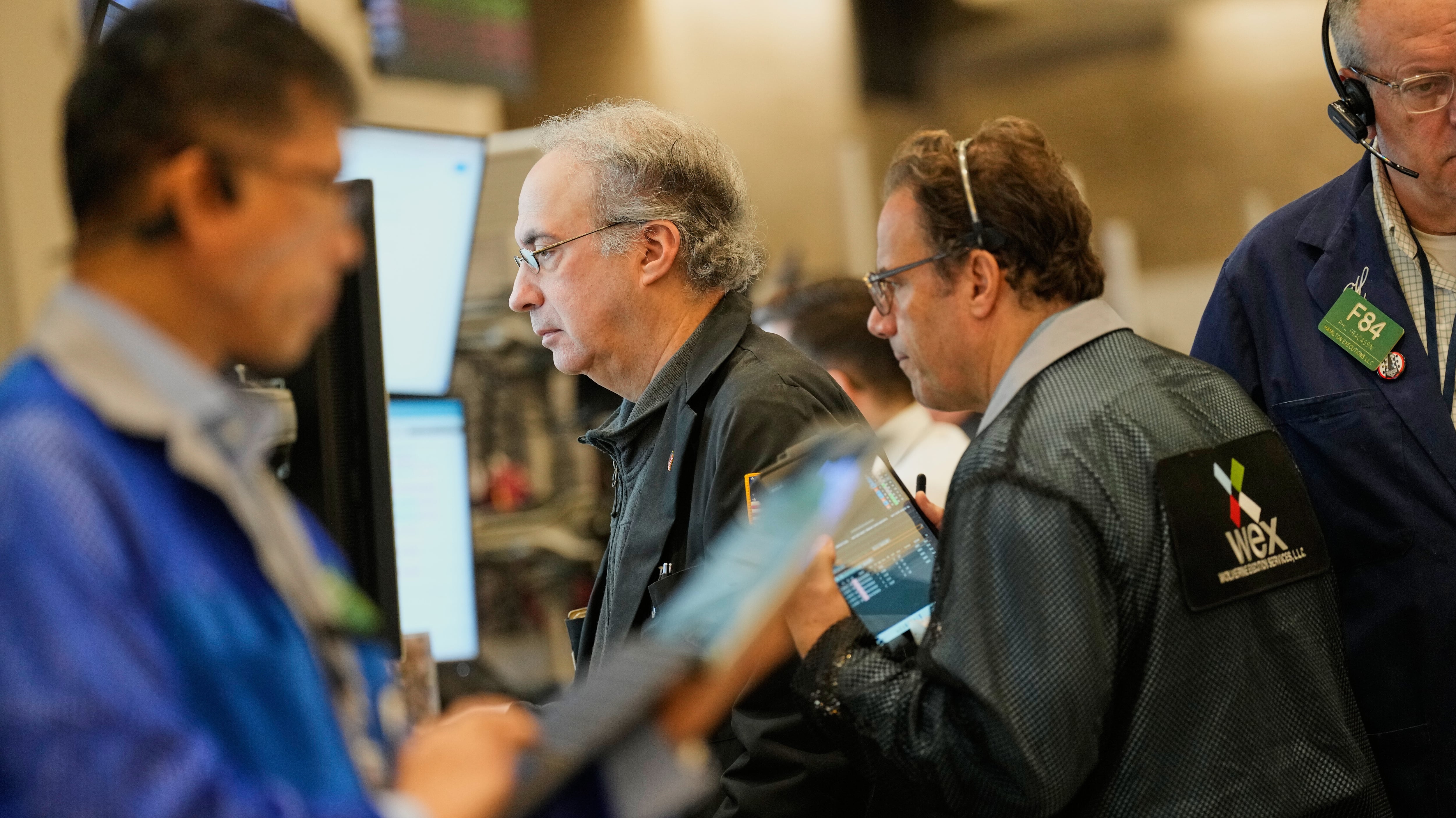 Options traders work on the floor at the New York Stock Exchange in New York, Wednesday, Oct. 29, 2025. (AP Photo/Seth Wenig)